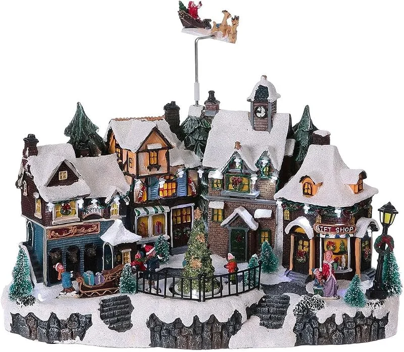 Marke: Avilia Avilia Animiertes Weihnachtsdorf mit LED-Beleuchtung und Weihnachtsmusik – Ideal für die einzigartige und Moderne Dekoration Ihres Hauses – Hergestellt aus langlebigen Materialien – 31 x 38 x 22 cm — Weihnachtsdeko
