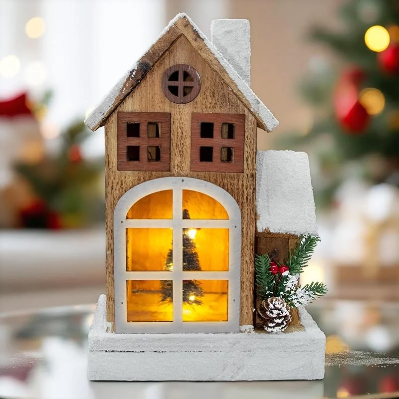 Besuche den Spetebo-Store Spetebo LED Holz Weihnachts Haus mit Schneedach - 29 cm - Lichterhaus Tisch Fenster Deko beleuchtet mit weihnachtlichem Zierschmuck — Weihnachtsdeko